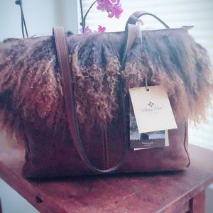 Handbag, the Tibetan lamb collection.